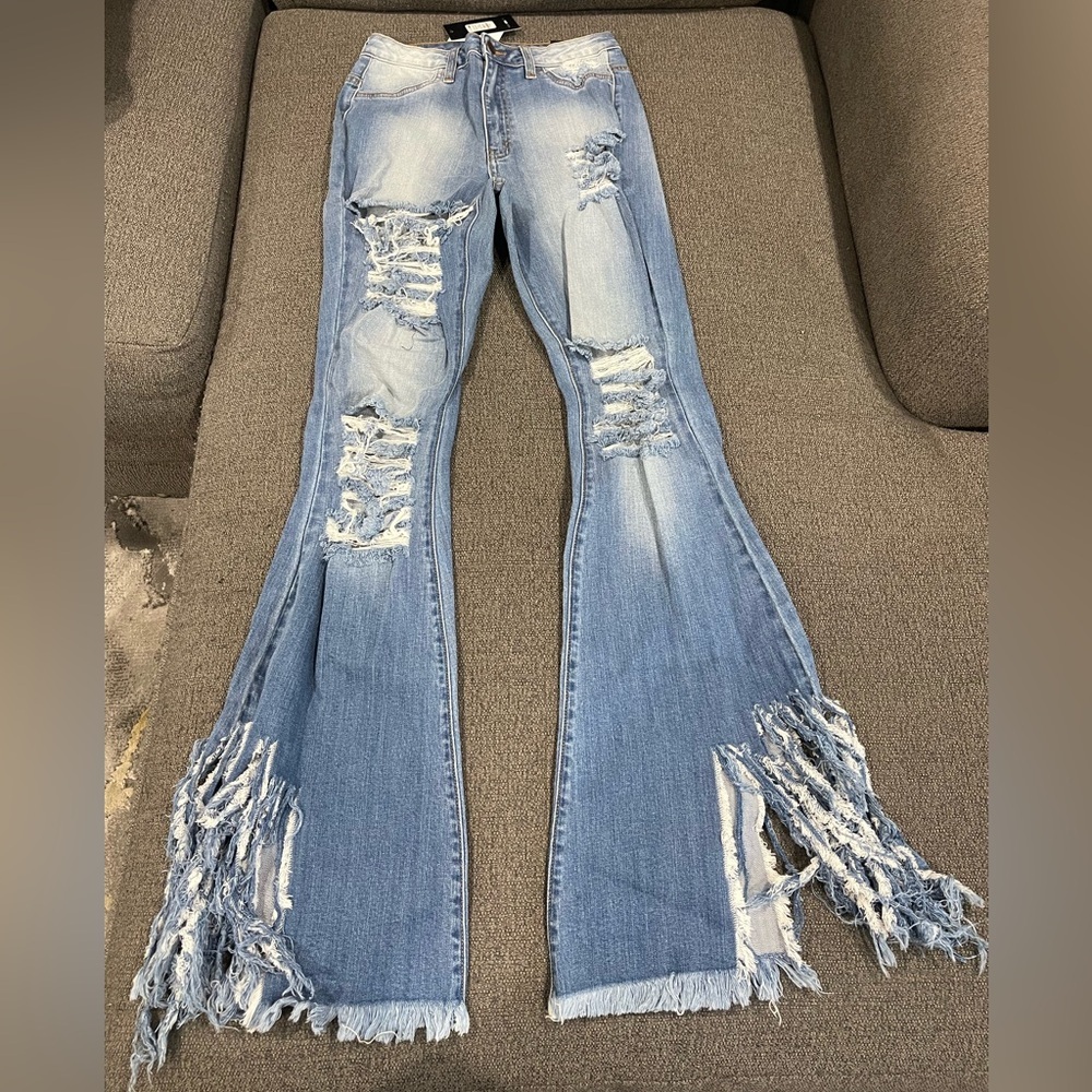FashionNova Distressed Blue Flare leg Women's Jeans